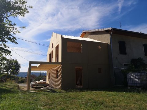 Extension de maison en ossature bois avec terrasse 