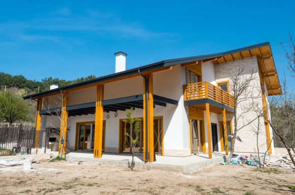 Conception et construction de maison en ossature bois par menuisier à Annecy